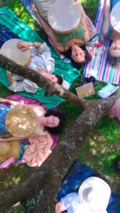 drum making, drum journey, women lying under tree